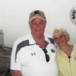 A man and woman standing next to each other.