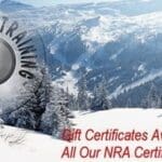 A picture of the mountains with snow and trees.