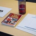 A book and cup on the table