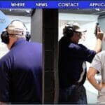 Two men are standing in a gun range.
